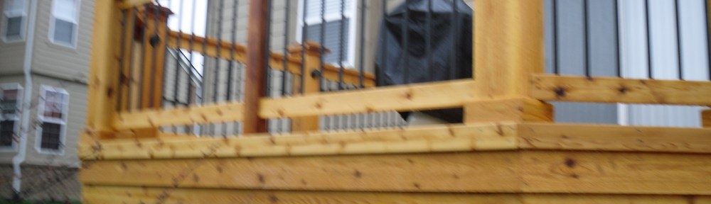Cedar deck railing finished with TWP wood stain